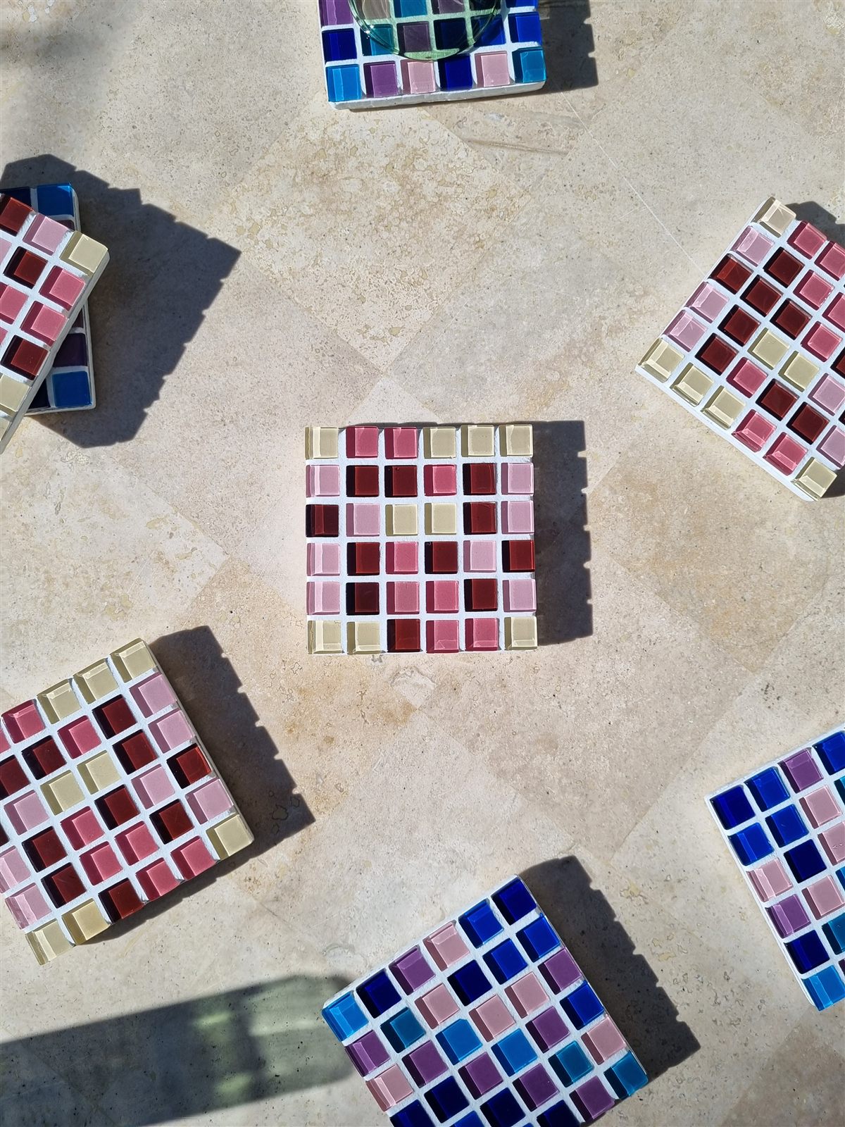 Cocoa Berry coaster, berry pinks, plum and latte glass tiles in afternoon sun