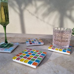 Fairy Bread coaster, bright multicoloured glass tiles on travertine