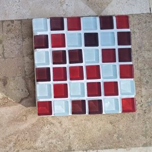Lamington Smash coaster, scattered raspberry red and white glass tiles